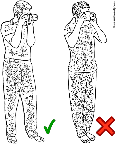 4-holding_camera_standing_position